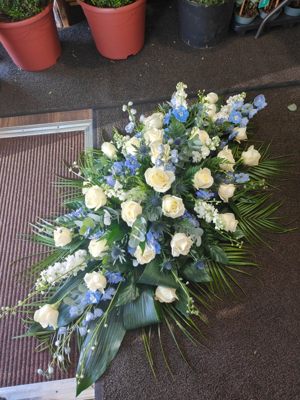 Rose and Delphinium Casket Spray