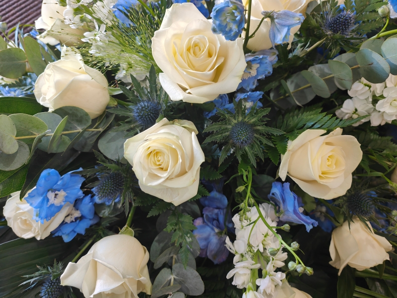 Rose and Delphinium Casket Spray