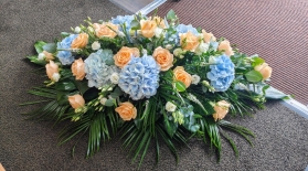 Blue  and Peach casket spray